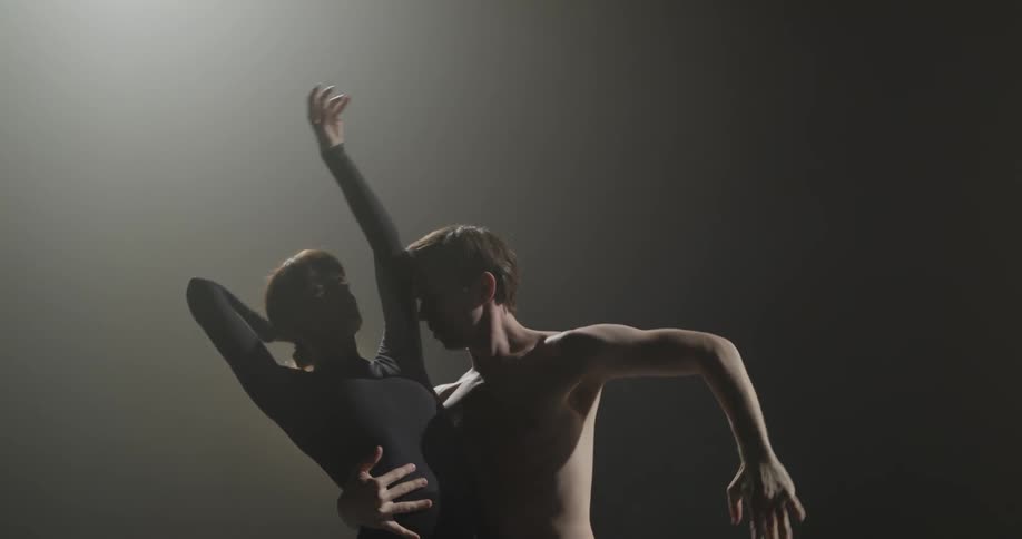 Two people dance together