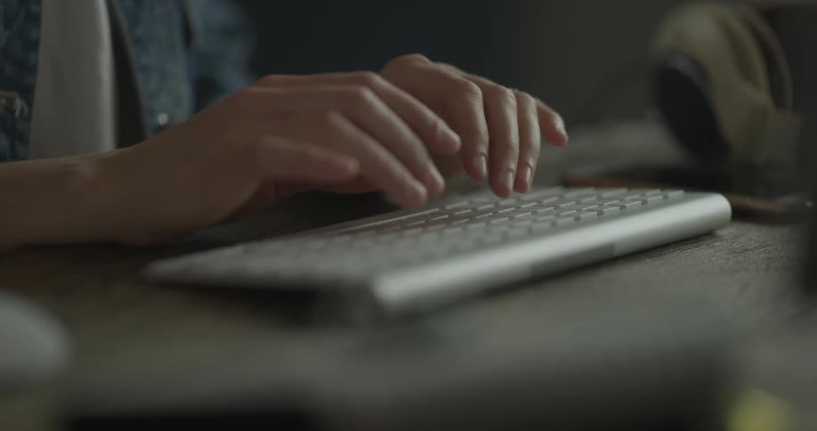 Woman Working On Computer In Studio
