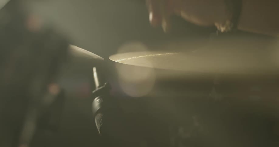 A person is playing the drums