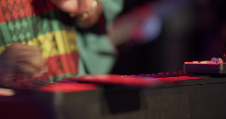 Man plays keyboard as he dances