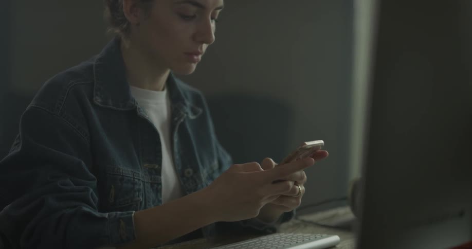 Woman Working On Computer In Studio