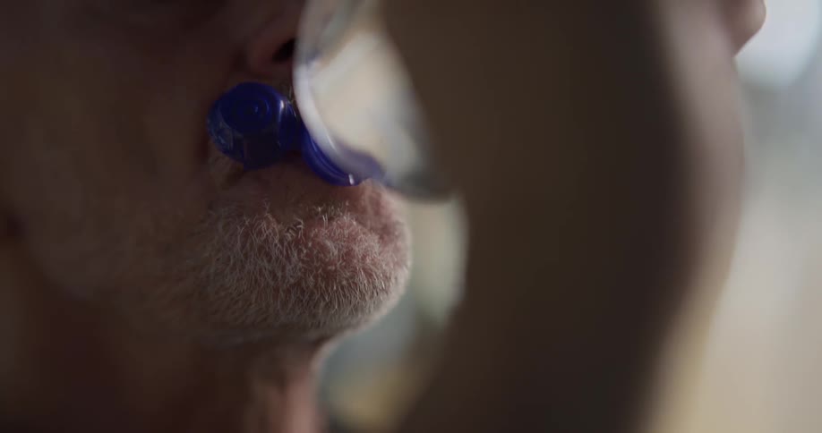 Man drinking a bottle of water