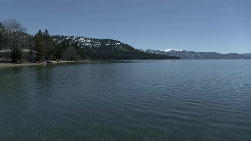 The water is moving along the shore