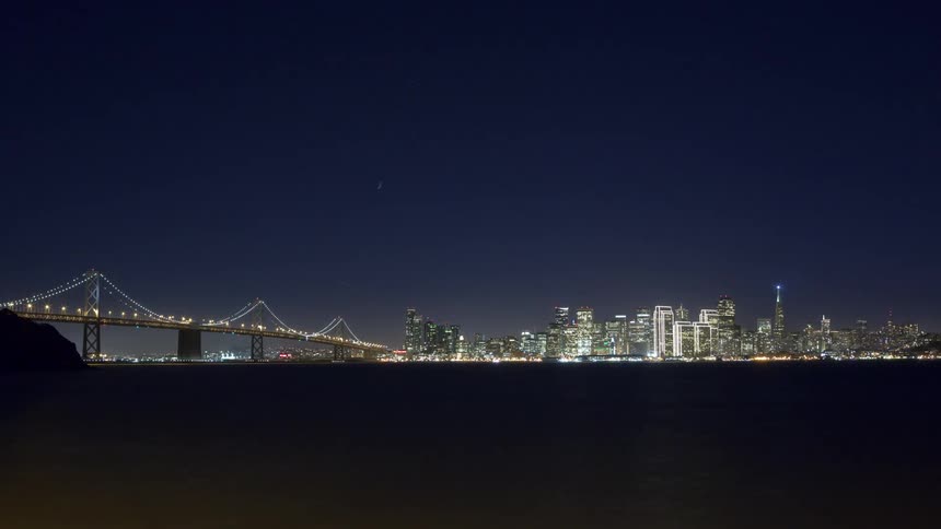 Cars are moving in the city at night