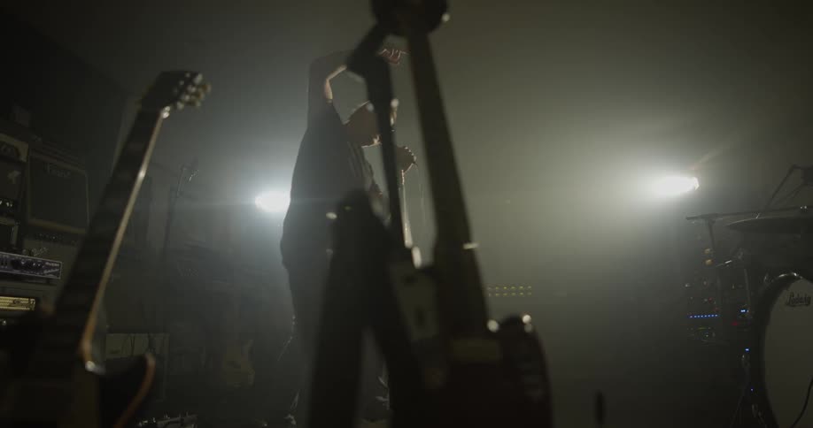 A man performing with a microphone