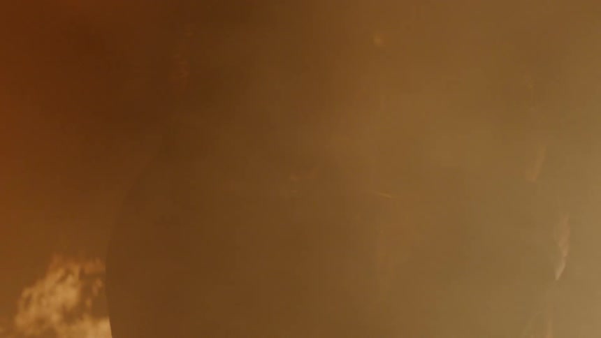 Couple Kissing By Fire In Desert
