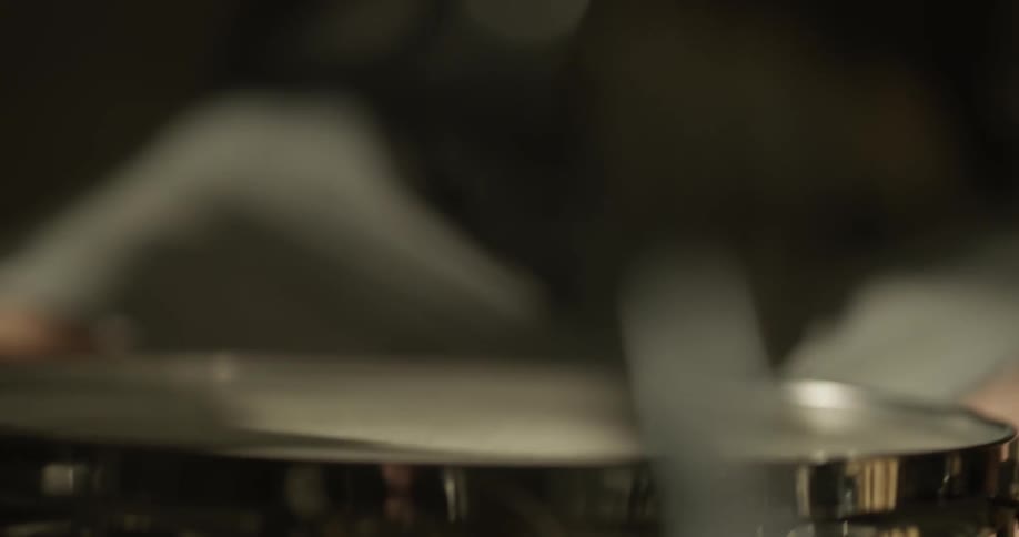 A man plays the drums