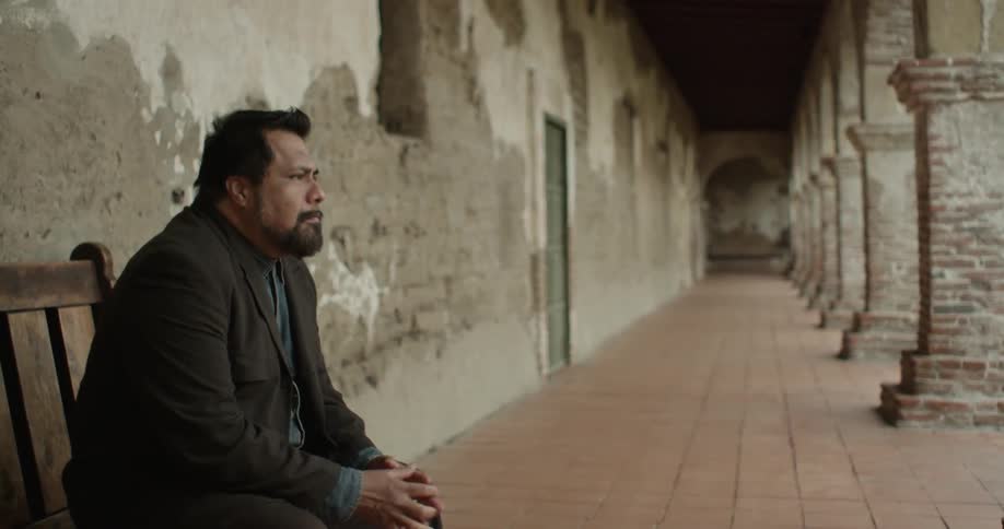 A person sitting on a bench