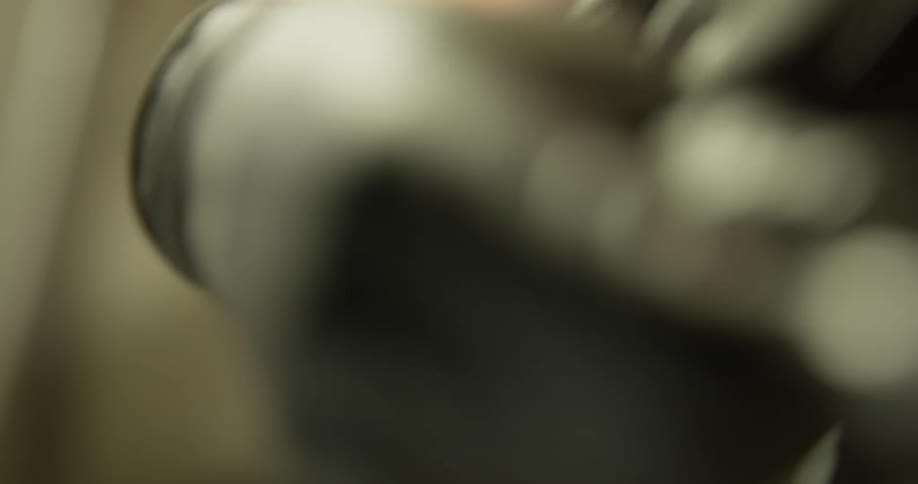 A person using a wrench