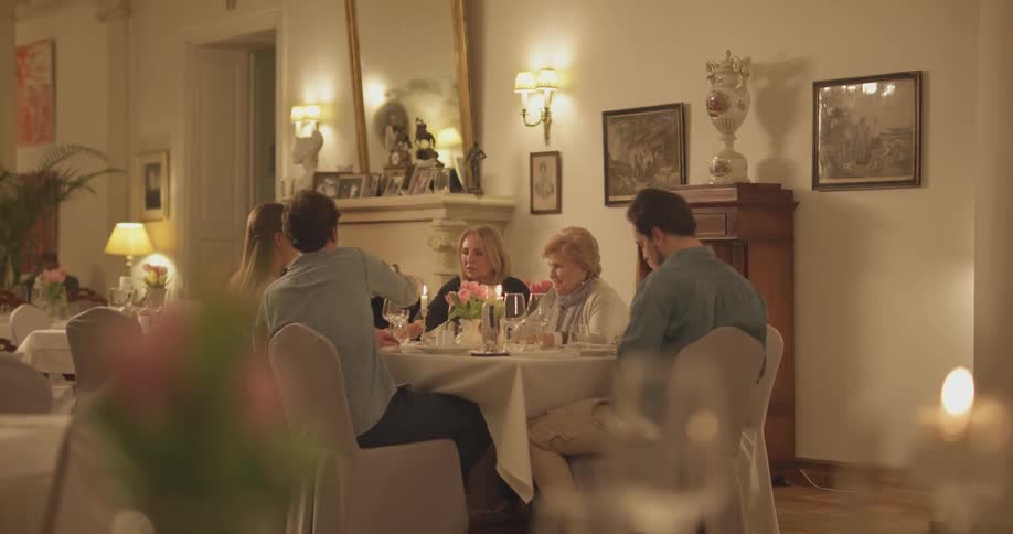A group of people dine together