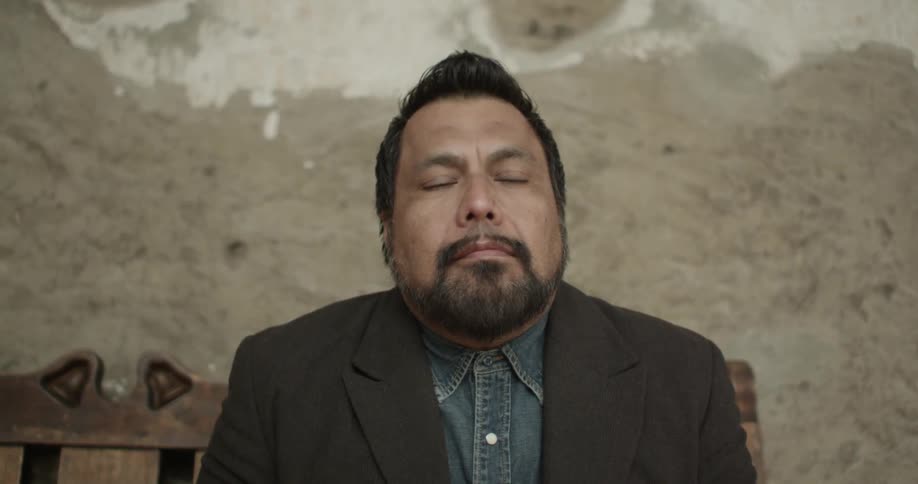 Man Mourns The Loss Of His Family