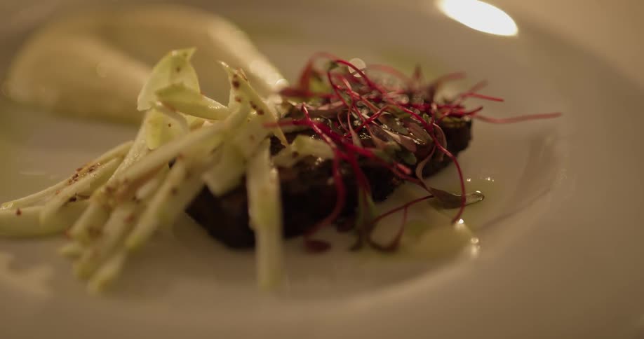 An intricate course of food is served