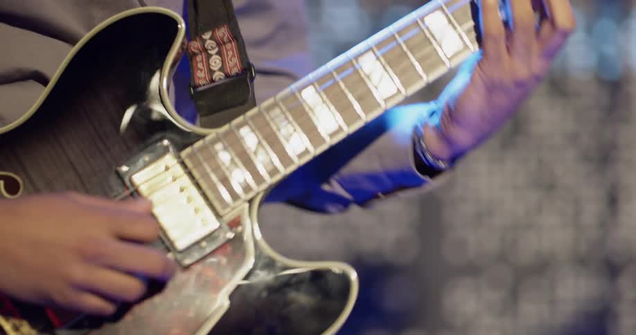 Man plays guitar