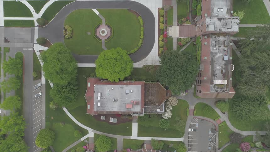 A lot of buildings in a grassy area