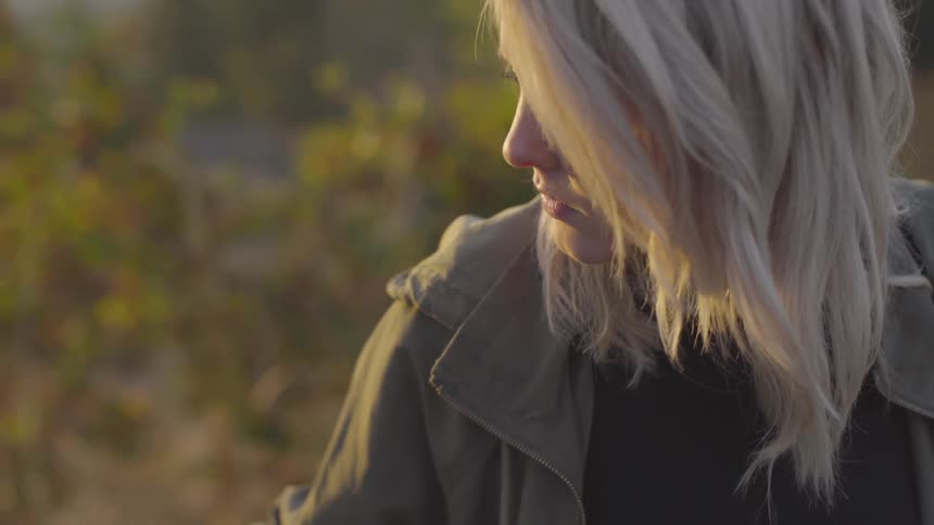 A woman looking at someone in the distance