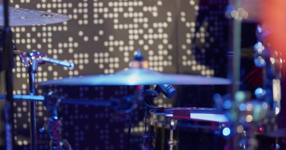 A man plays the drums
