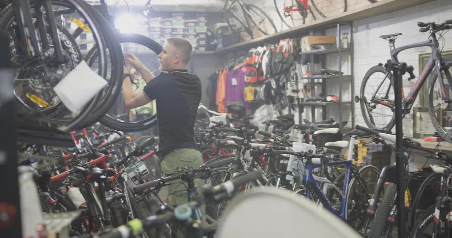 A man working in a bicycle shop