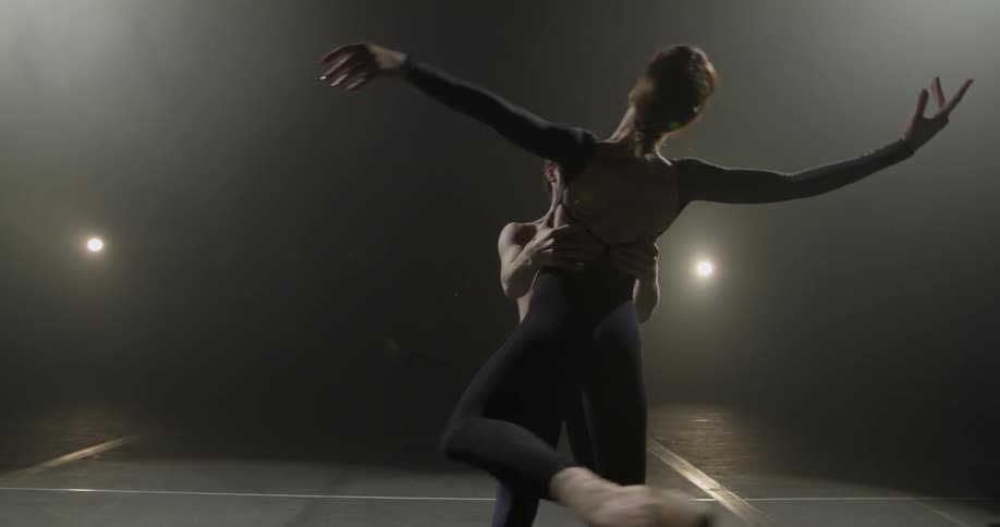 Man and woman dancers perform together