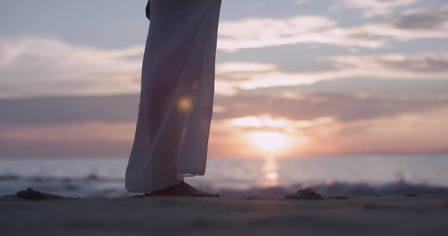 A woman's dress flows around her
