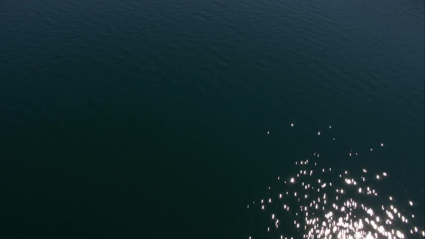 The sun is shining on the ocean