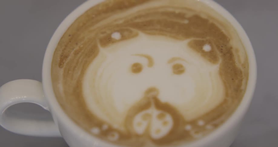 A cup is filled with liquids in shape of an animal
