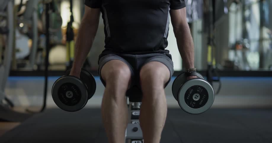 Man Working Out In Gym