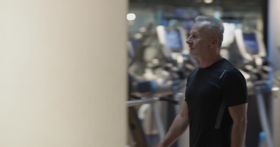 A man walking into a gym