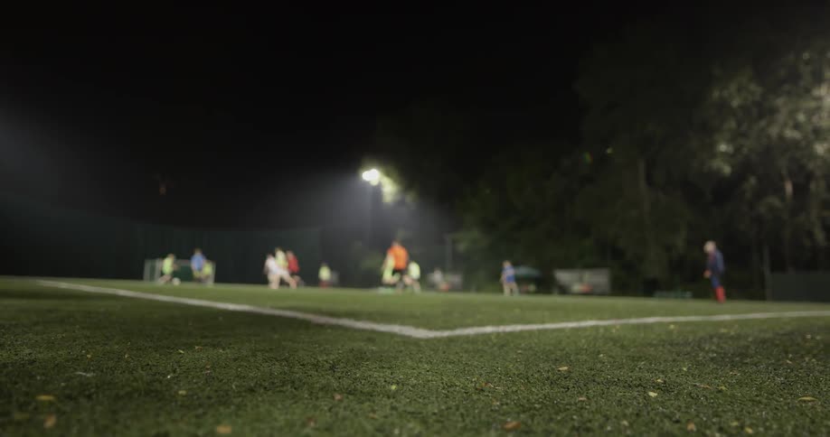 People are playing soccer together