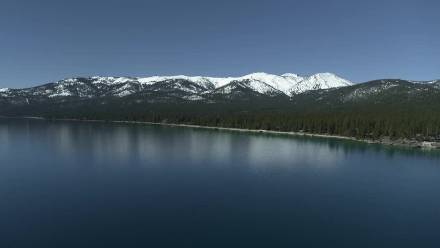Mountains sit generously over the water