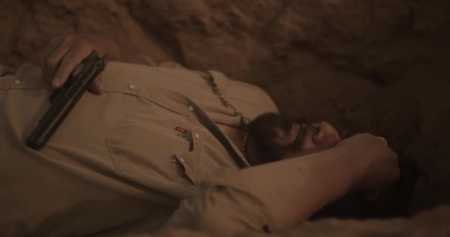 A person is holding a gun