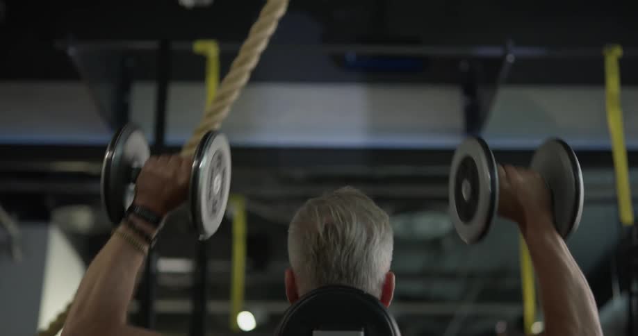 Man Working Out In Gym