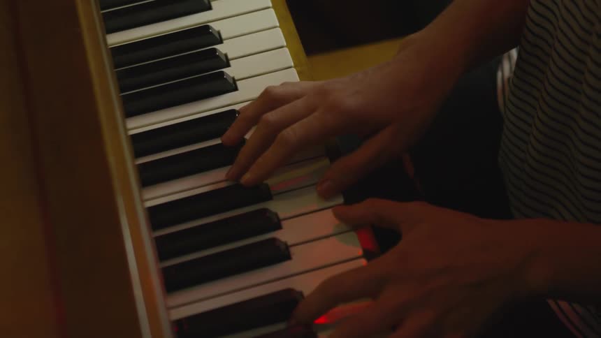 Person playing piano