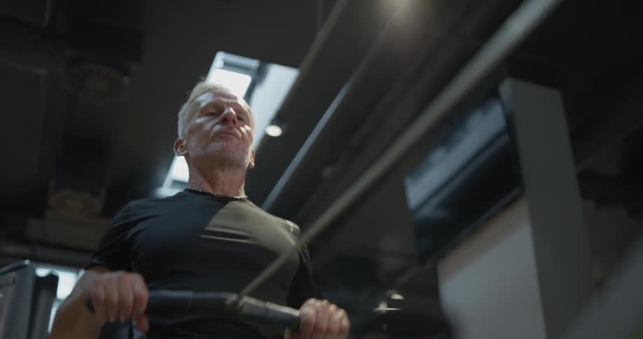 A man is working out using equipment