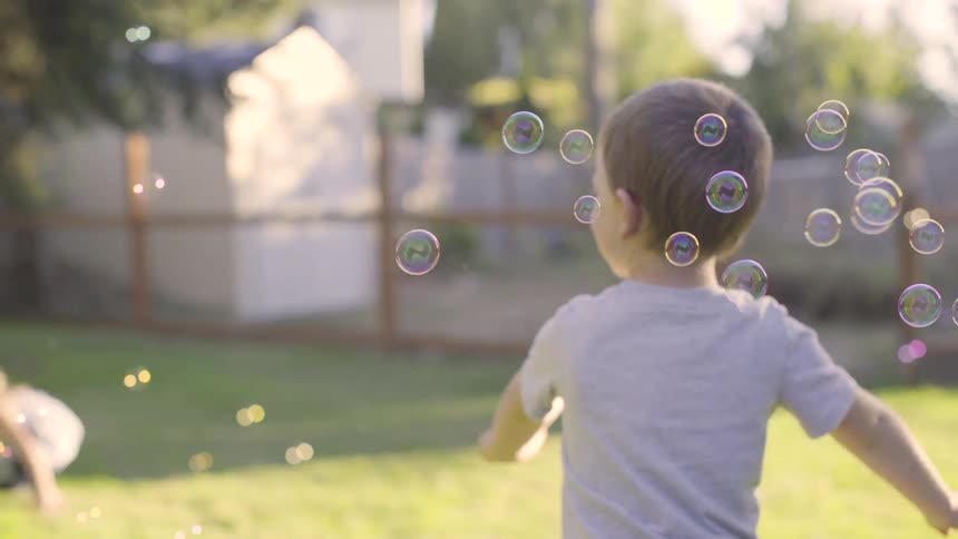 Kids Playing In Backyard