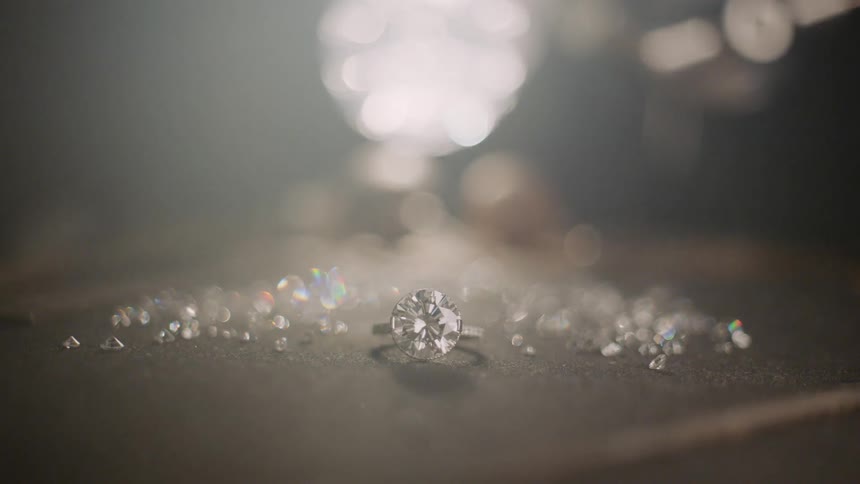 A piece of jewelry sparkling with some smoke