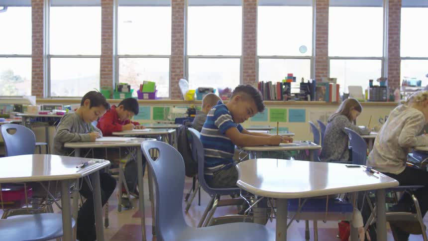 Child's classroom with kids working at desks