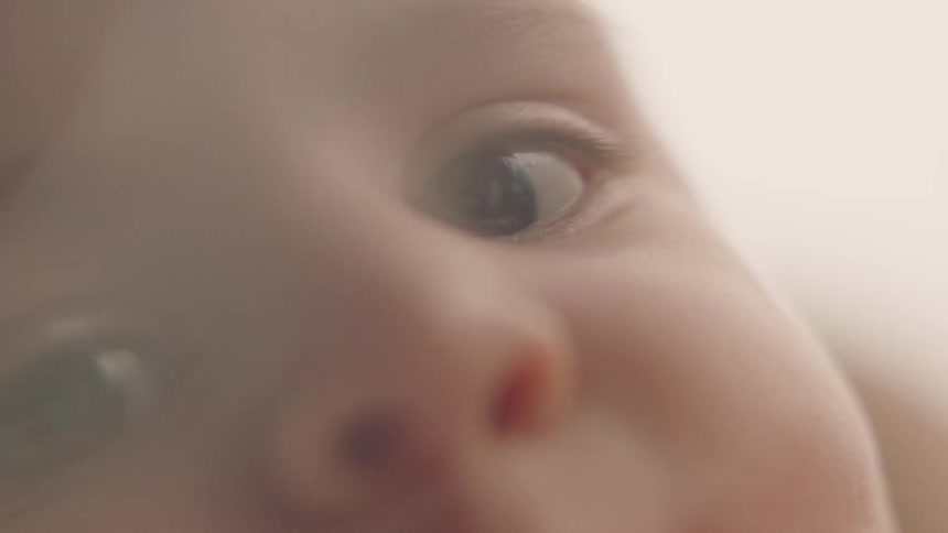 A baby is looking around