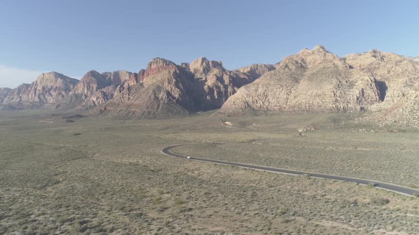 A car driving a deserted road