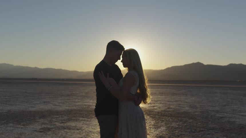 Couple Dancing In The Desert