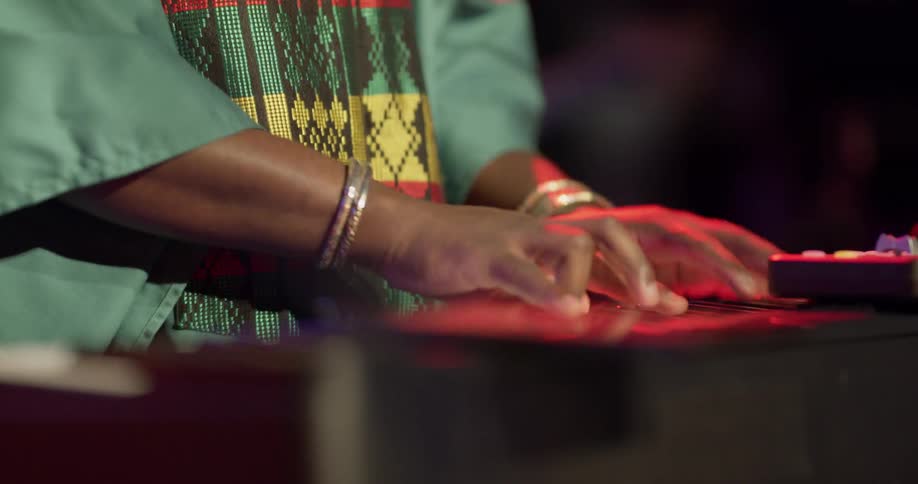 A person is playing the keyboard