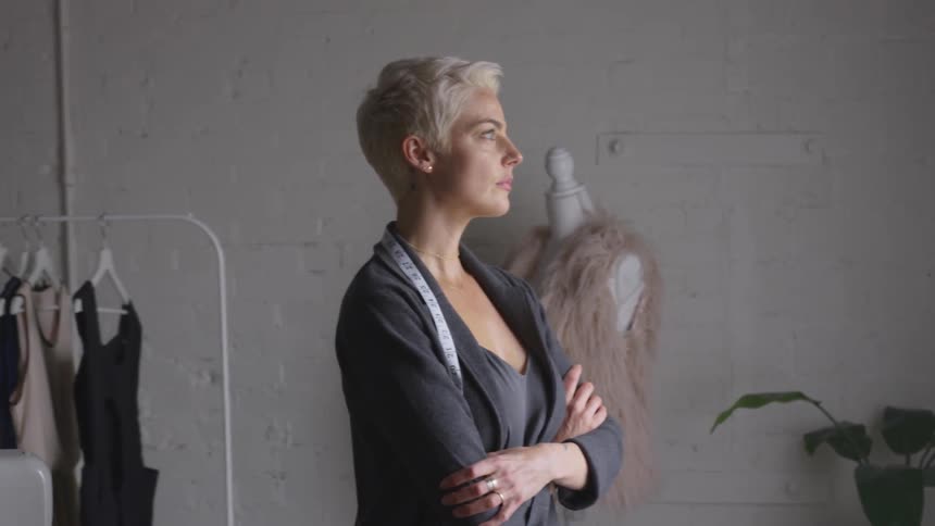 A woman has her arms crossed