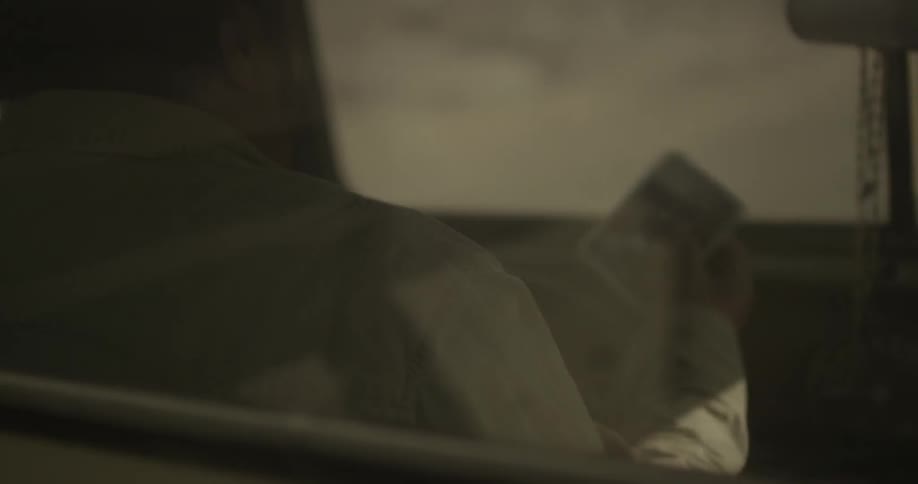 A person driving a car