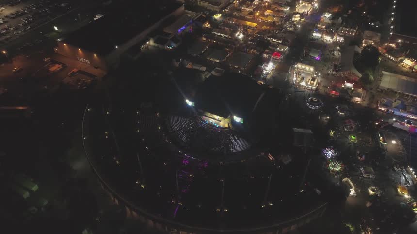A concert that is going on in a large venue