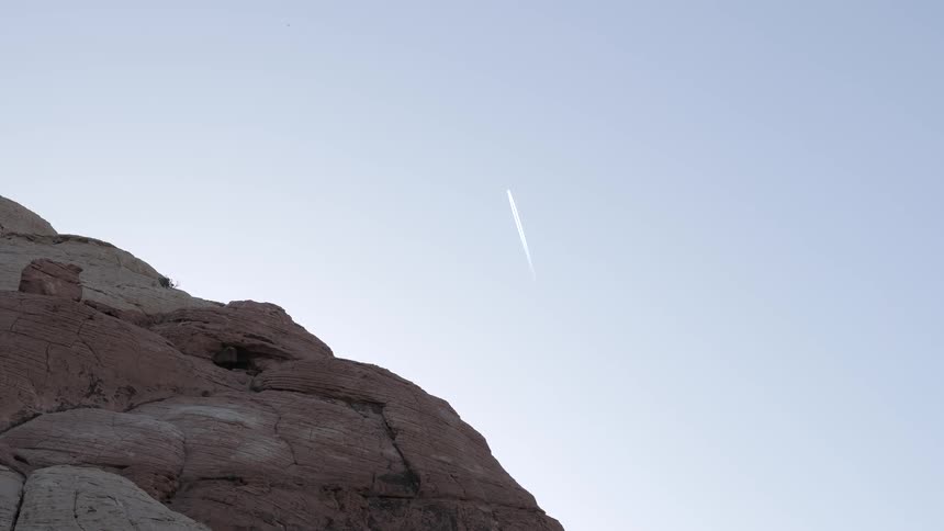 A rocket that is being launched into the air in the distance