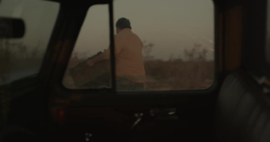 A man is carrying a trunk