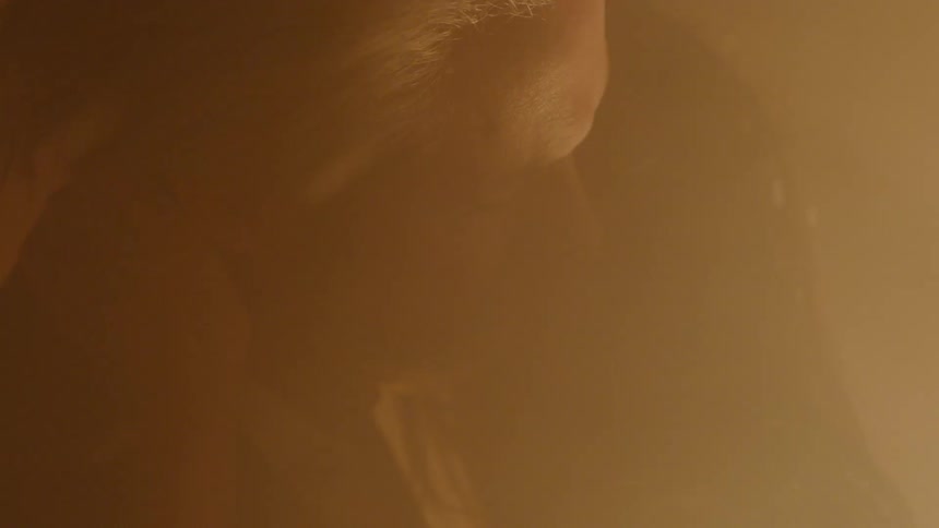Couple Kissing By Fire In Desert
