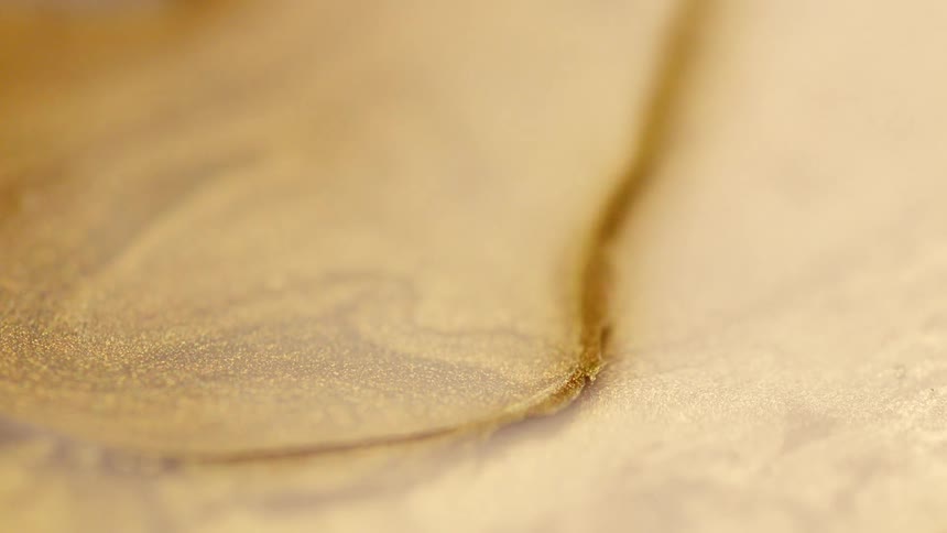 Coffee dripping into a cup