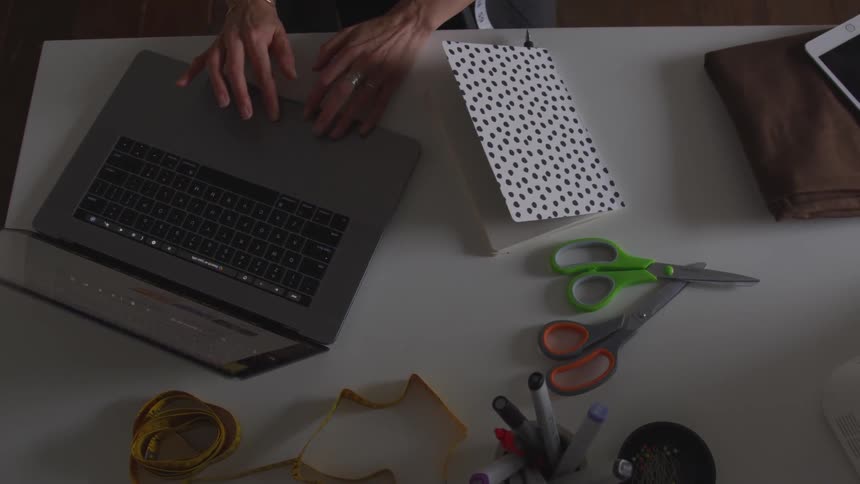 Fashion Designer In Studio