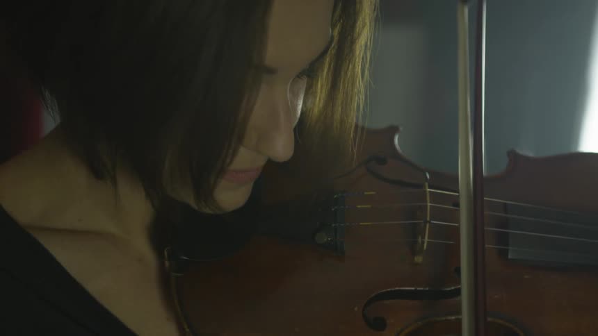 Woman plays violin