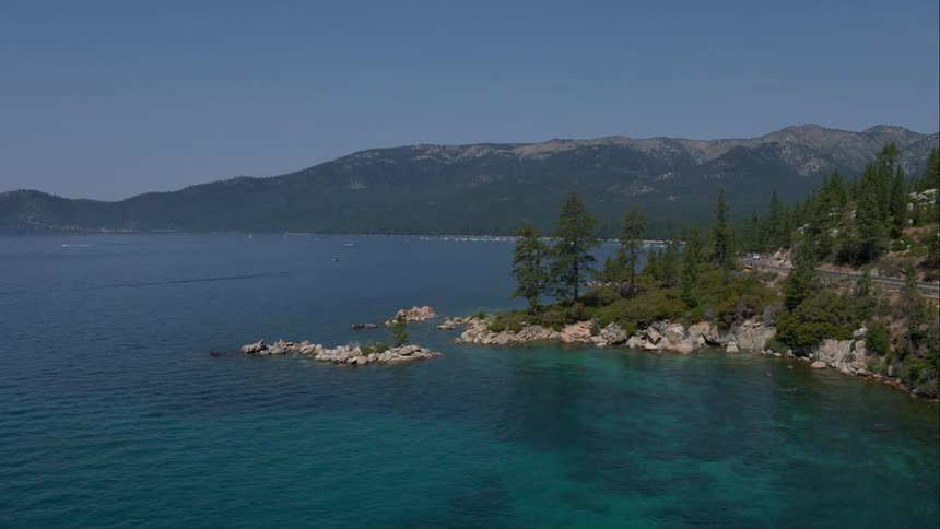 Trees line the water edge